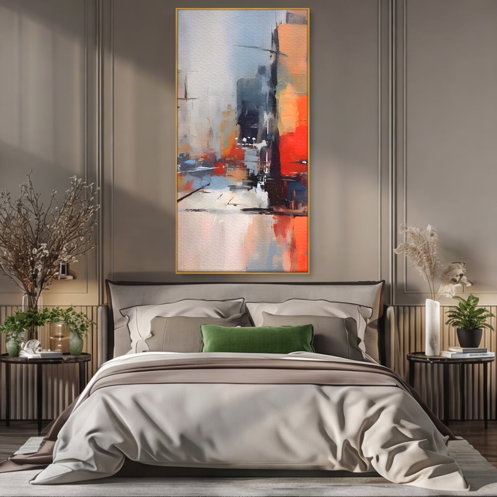 Tablou canvas cu pictura abstracta cu oras si cladiri, in rama de aluminiu auriu, pe perete intr-un dormitor